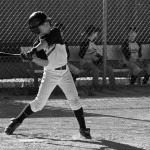 Boy swinging baseball bat 1