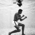 Cassius Clay training in a pool at the Sir John Hotel in Miami, 1961