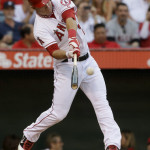 Los Angeles Angels' Mike Trout hits a home run against the Detroit Tigers during the first inning of a baseball game in Anaheim, Calif. Saturday, Sept. 8, 2012. (AP Photo/Chris Carlson)